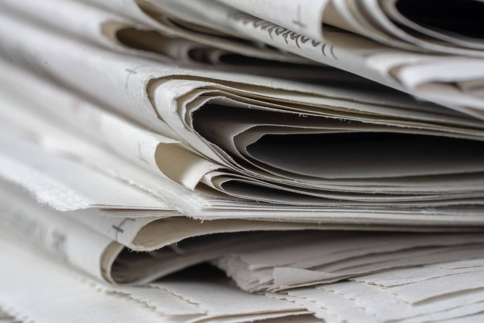 Close-up of folded newspaper pages